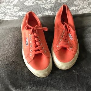 Orange Superga tennis shoes